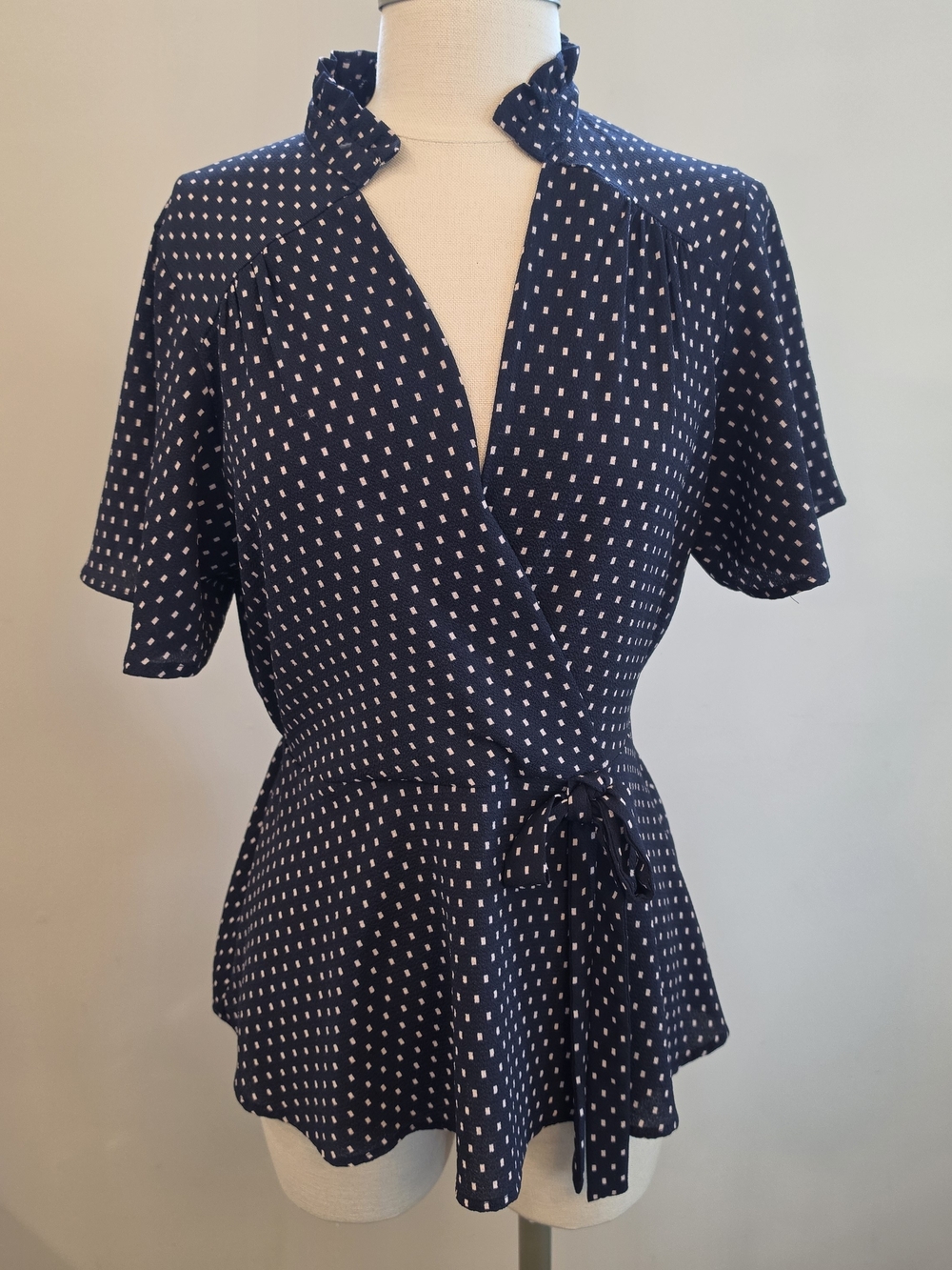 Monteau Navy and White Polka Dot Wrap Peplum Blouse